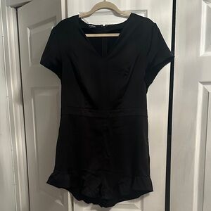 bebe Black Ruffle Hem Skort